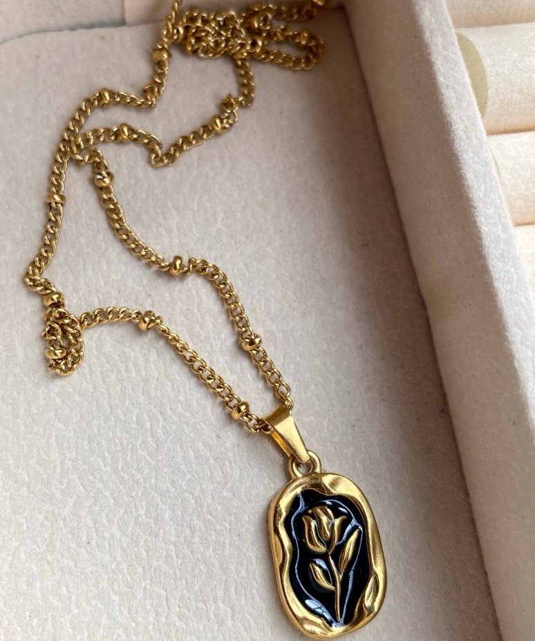 screenshot-88 Vintage black flower pendant - Image 1