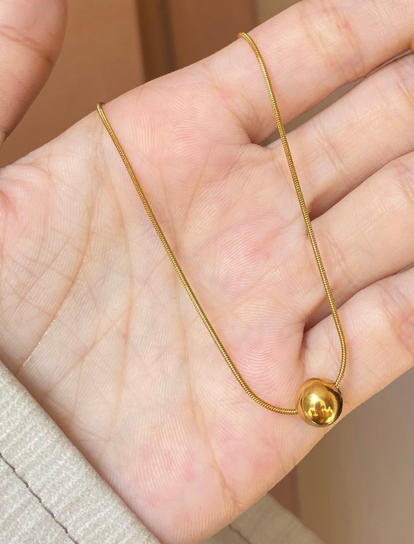 screenshot-106 Gold ball pendant - Image 1