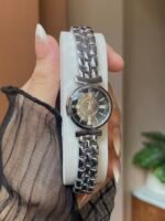 Channel black dial watch