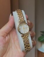 Channel golden white dial watch