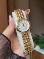 Gold beaded strap watch