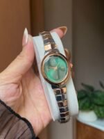 Aura green dial watch