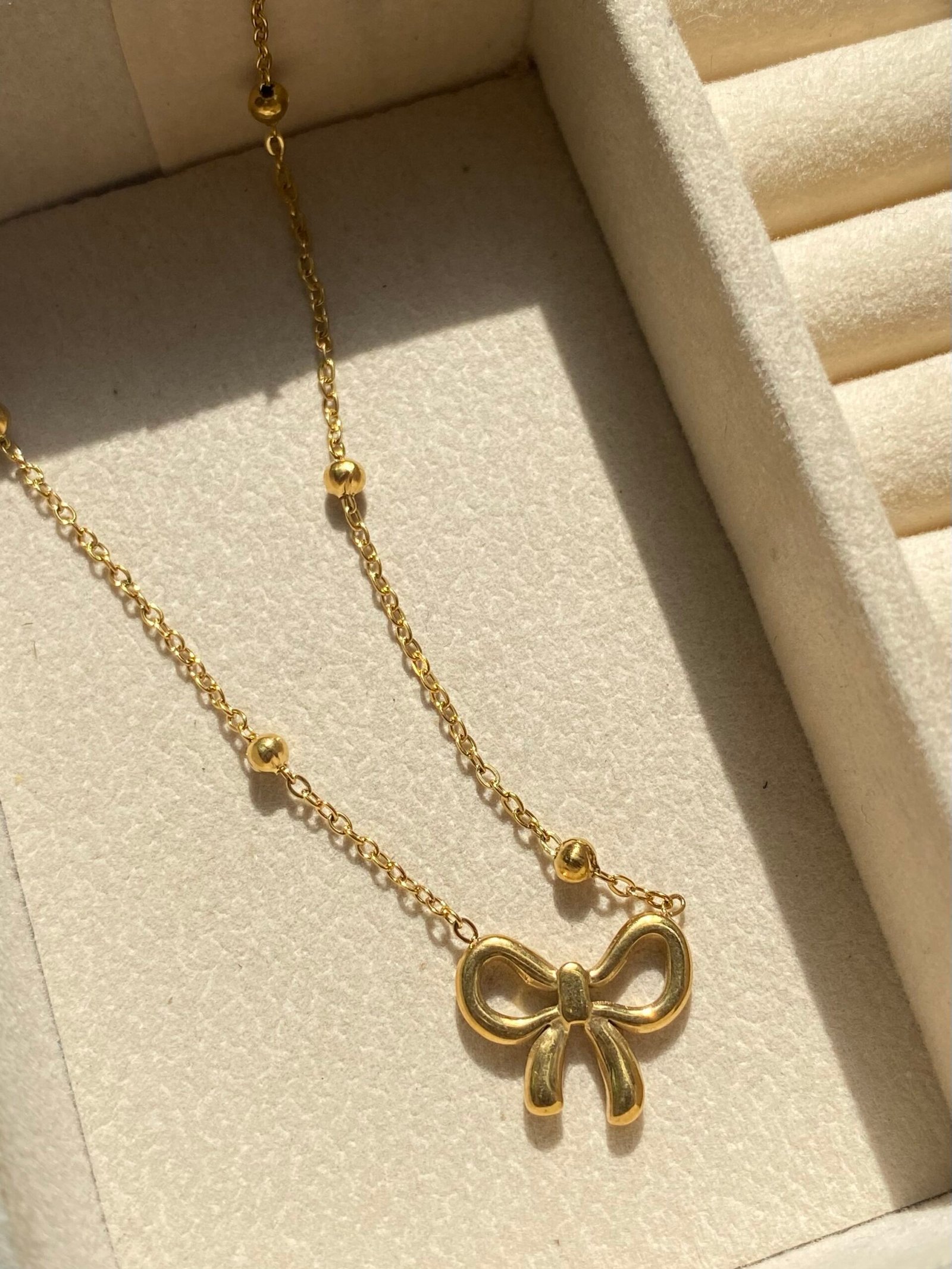 img_8226 Trendy bow pendant - Image 1